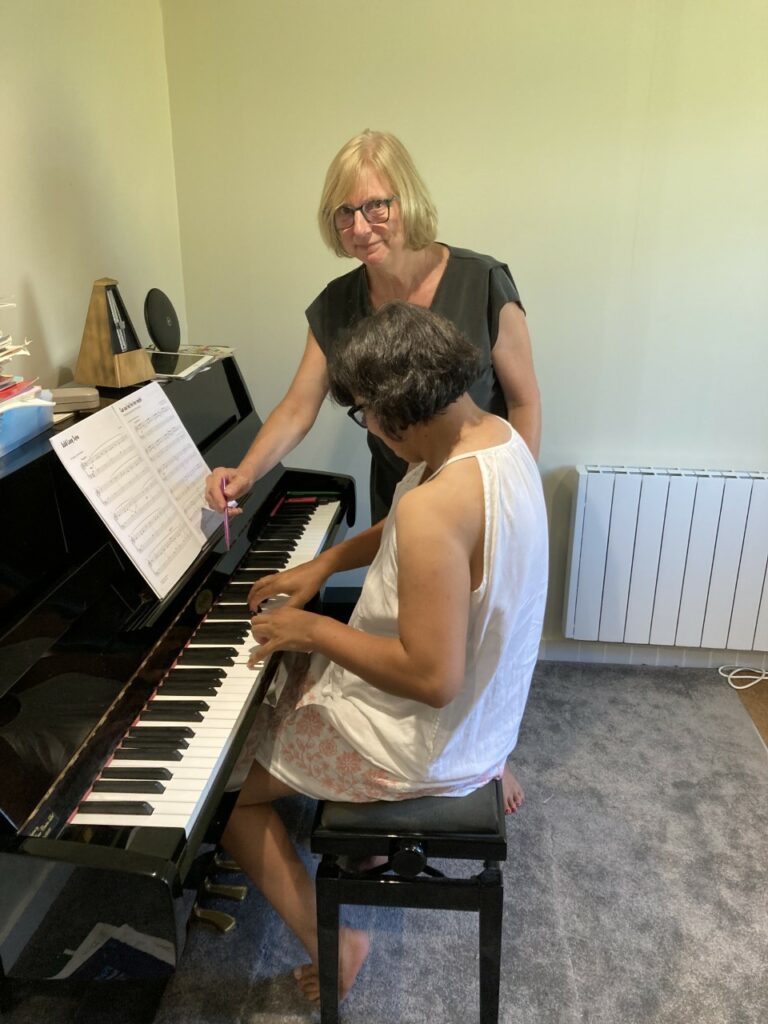 Frances Piano Teacher and Young Pupil